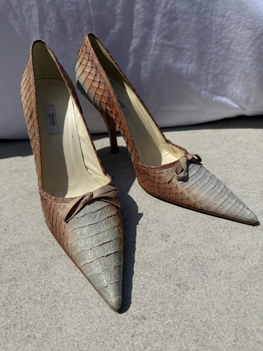 Prada Hombre Snakeskin Pointed Toe Pumps with Knot Detail